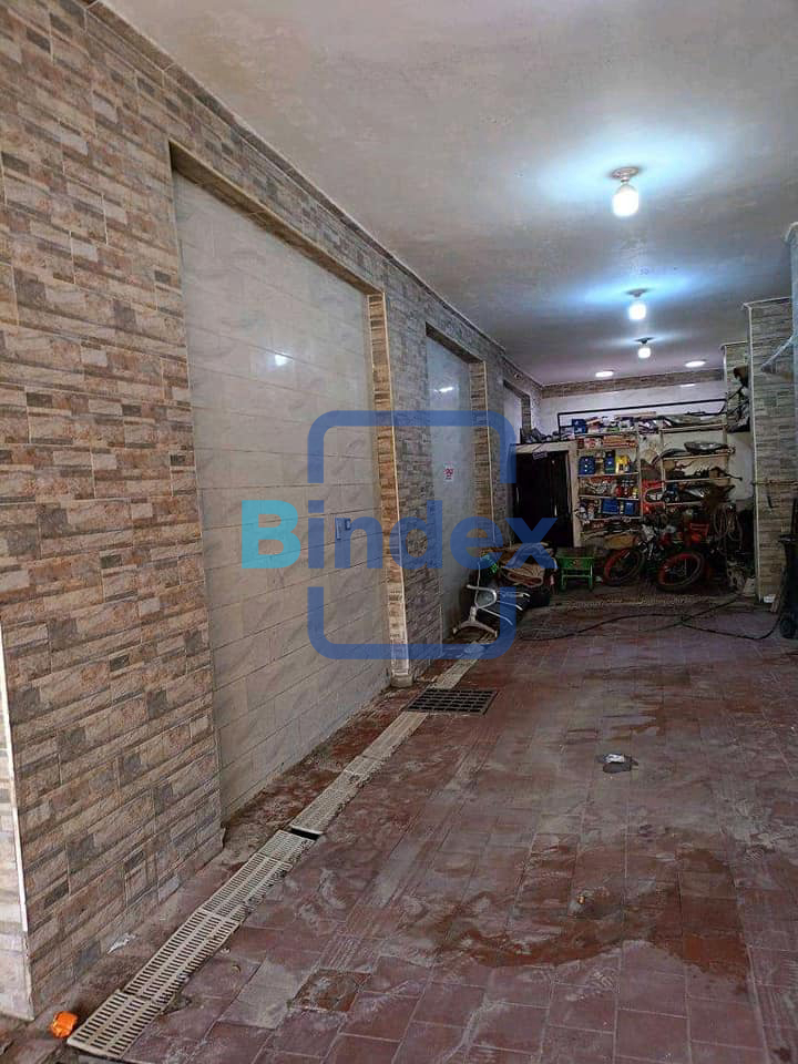 مغسله عربيات للبيع مساحتها 90 م وليها حصه في الارض في عين شمس