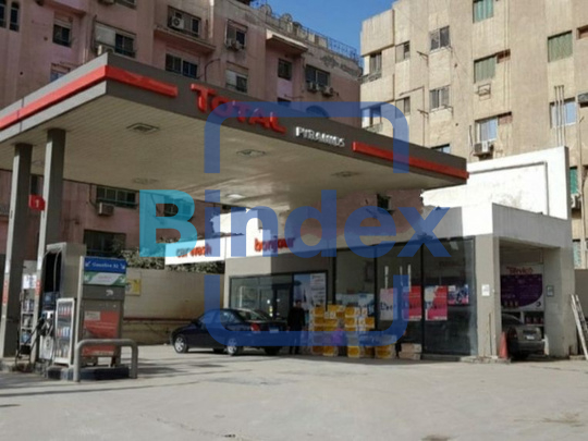  للبيع قطعة ارض مقام عليها محطة بنزين بشارع الهرم الرئيسى 