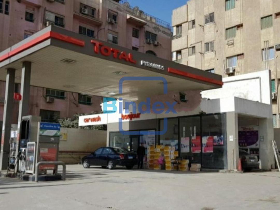  للبيع قطعة ارض مقام عليها محطة بنزين بشارع الهرم الرئيسى 
